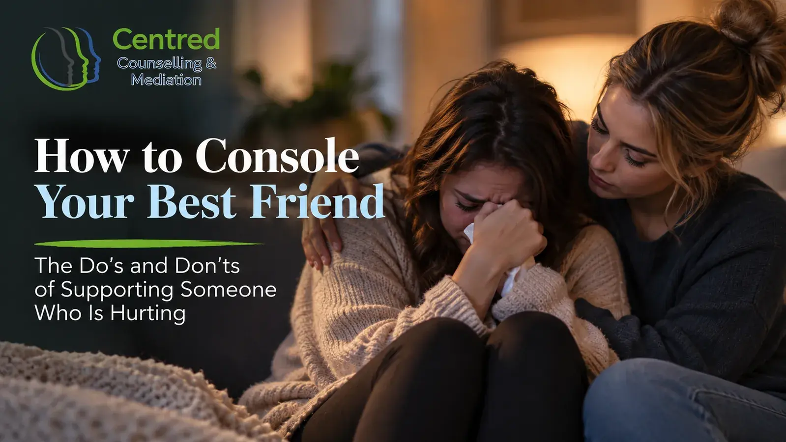 One friend sitting beside another and offering comfort during a difficult time.